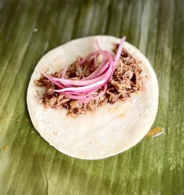  Cochinta Pibil: とろけるような豚肉と、柑橘系の香りに包まれた Yucatan の魔法！